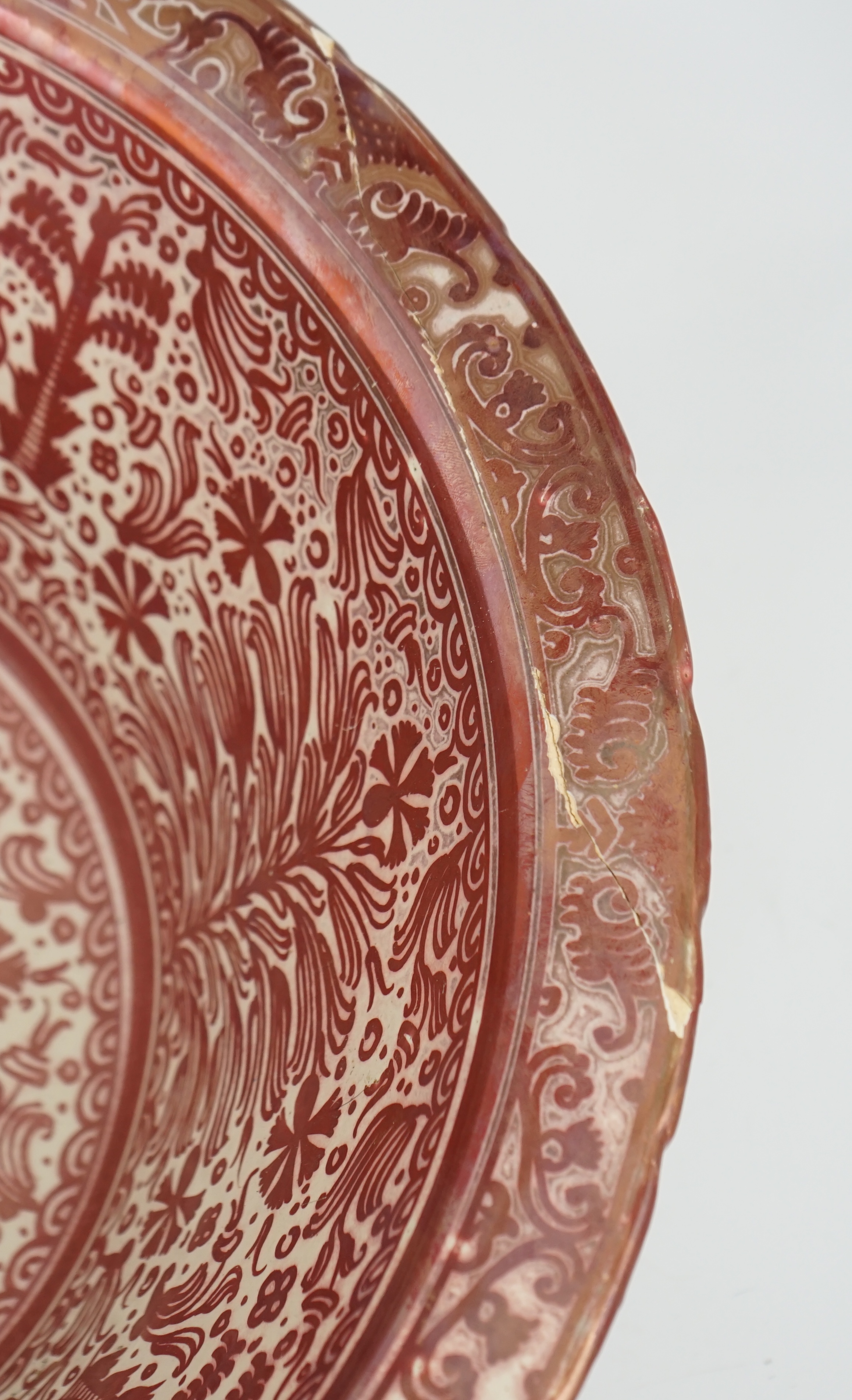 Ulisse Cantagalli, a large Hispano-Moresque style ruby-copper lustre basin, c.1900, some restoration